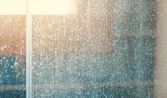 How to Remove Hard Water Stains from Your Shower Glass Doors